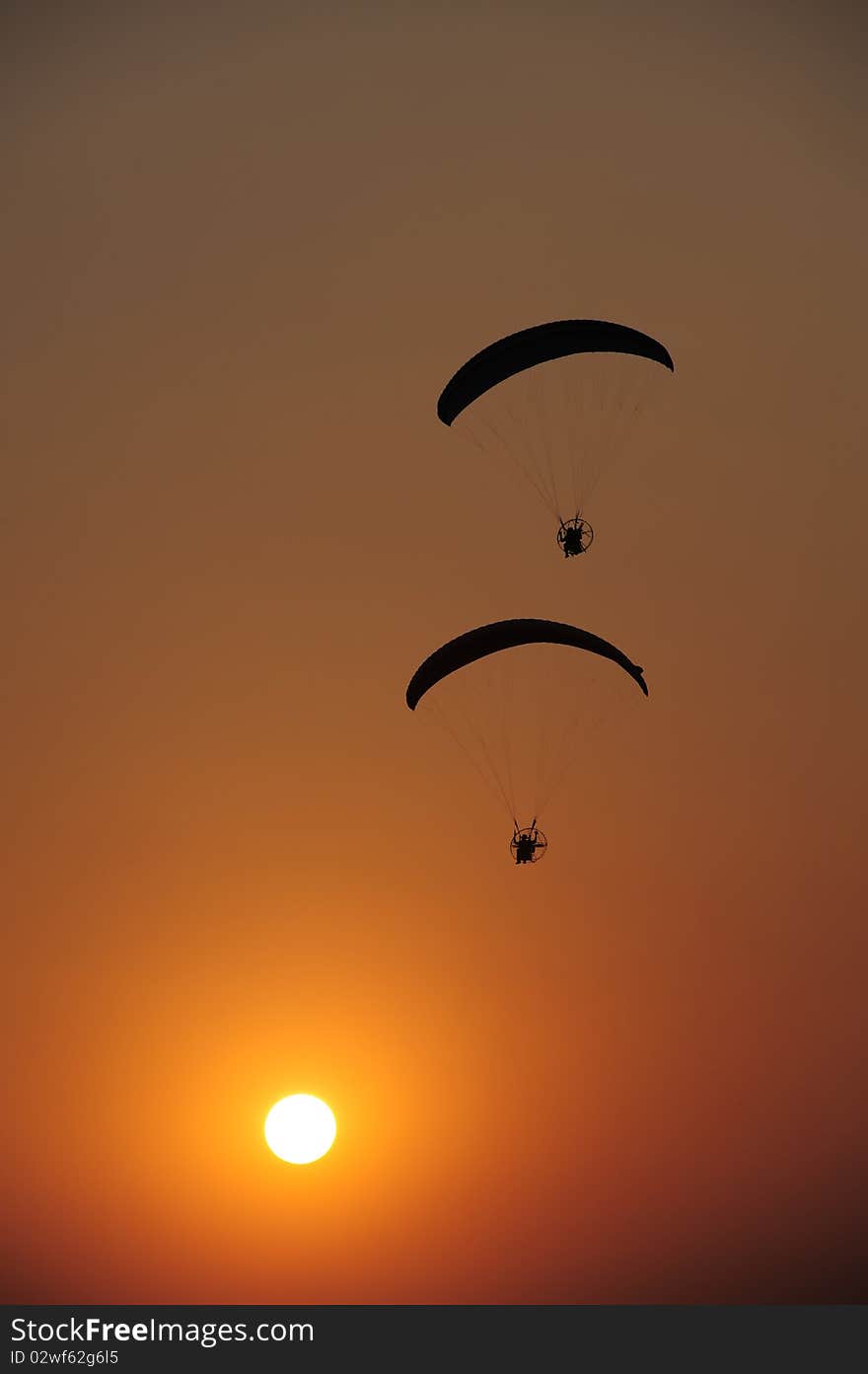 Paramotors At Sunset