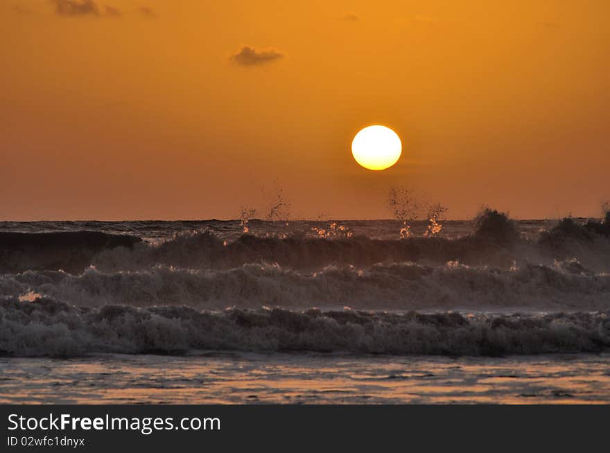 Sun on sea with orange background. Sun on sea with orange background