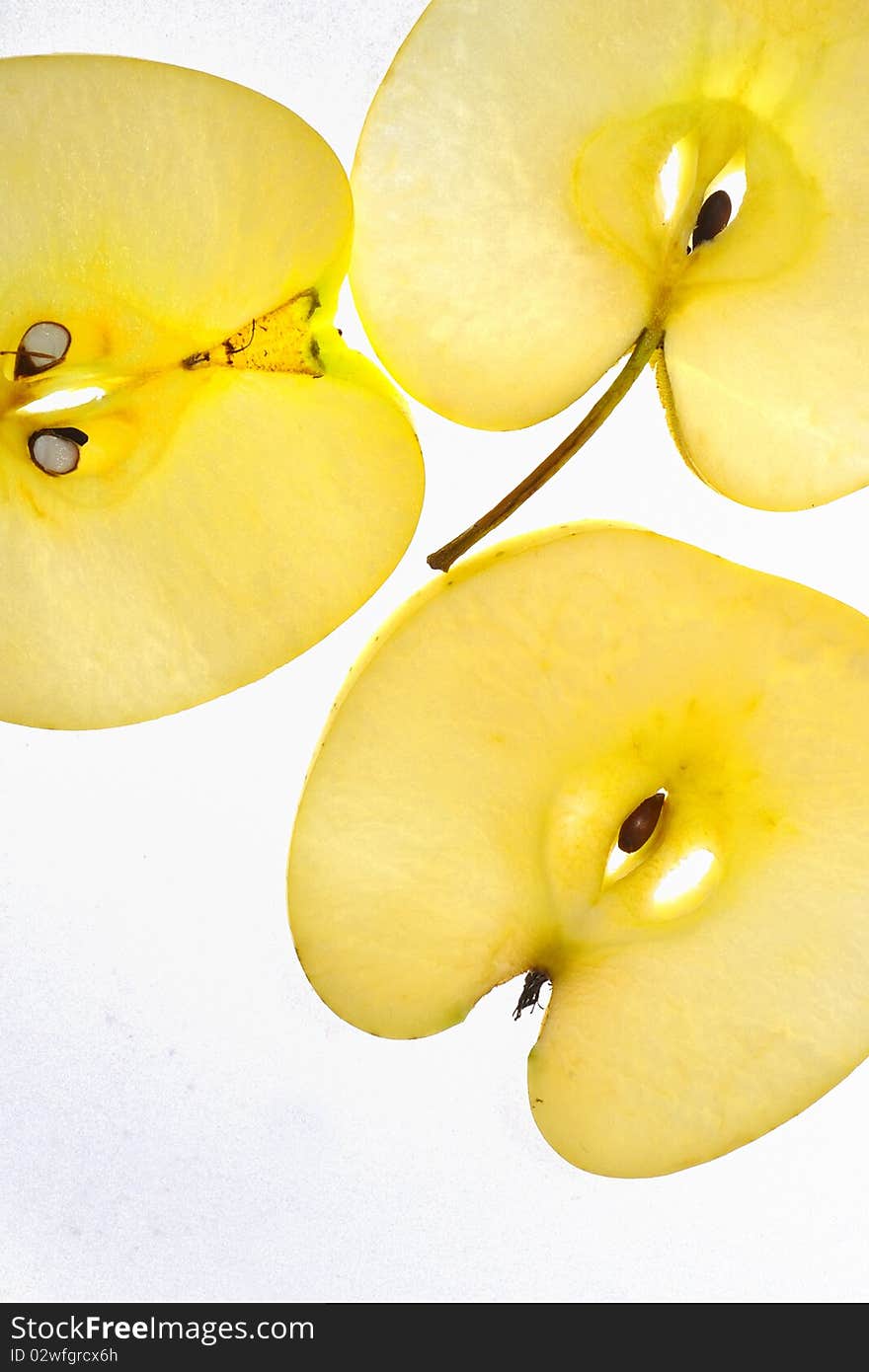 Apple slices details in studio on white