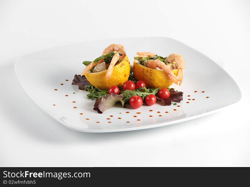 Seafood Salad Decorated On A White Plate