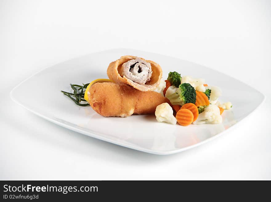 Delicious Meat Role With Vegetables On A Plate