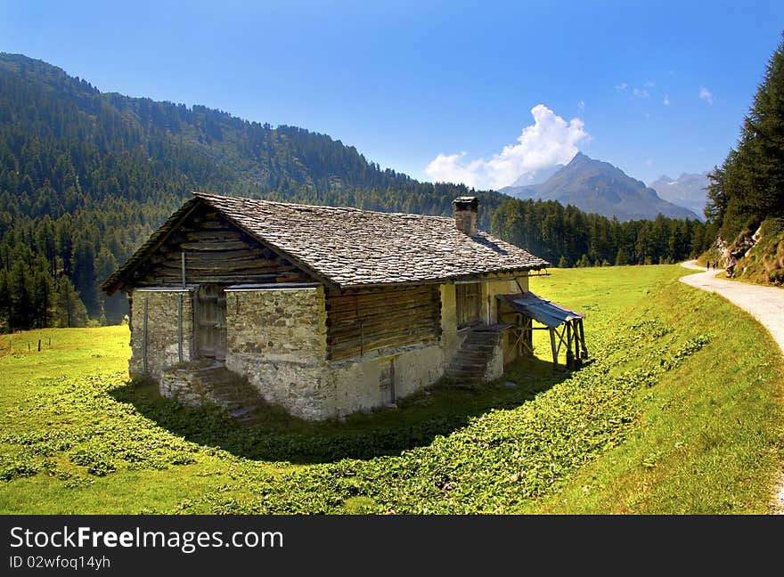 Mountain house in the middle of the lawn. Mountain house in the middle of the lawn