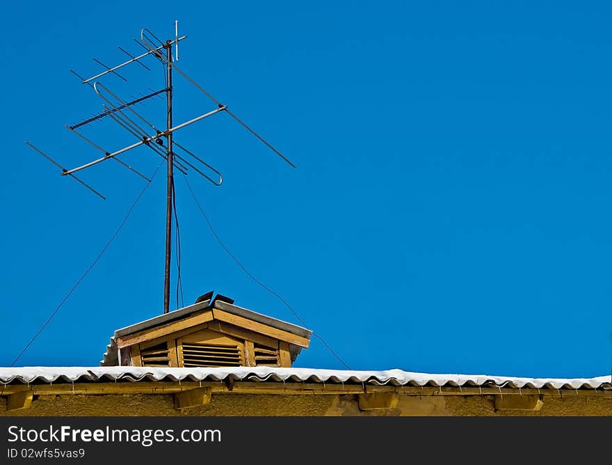 Home TV antennas mounted on a roof