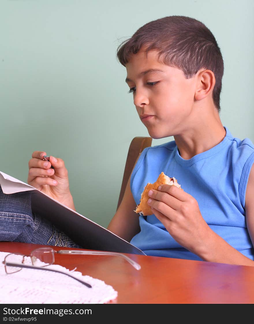 Boy, book and food