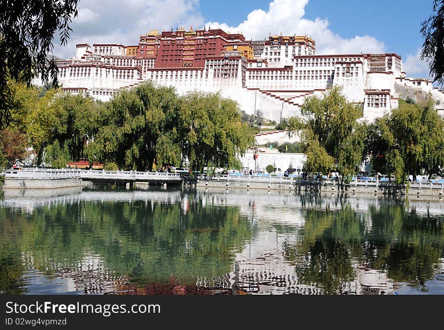 Scenery of the famous Potala Palace in Lhasa,Tibet,with a blurred mirror in the pond.