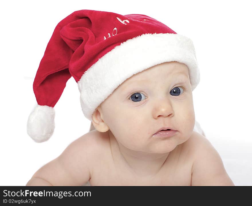 Close up of cute baby boy in santa hat. Close up of cute baby boy in santa hat