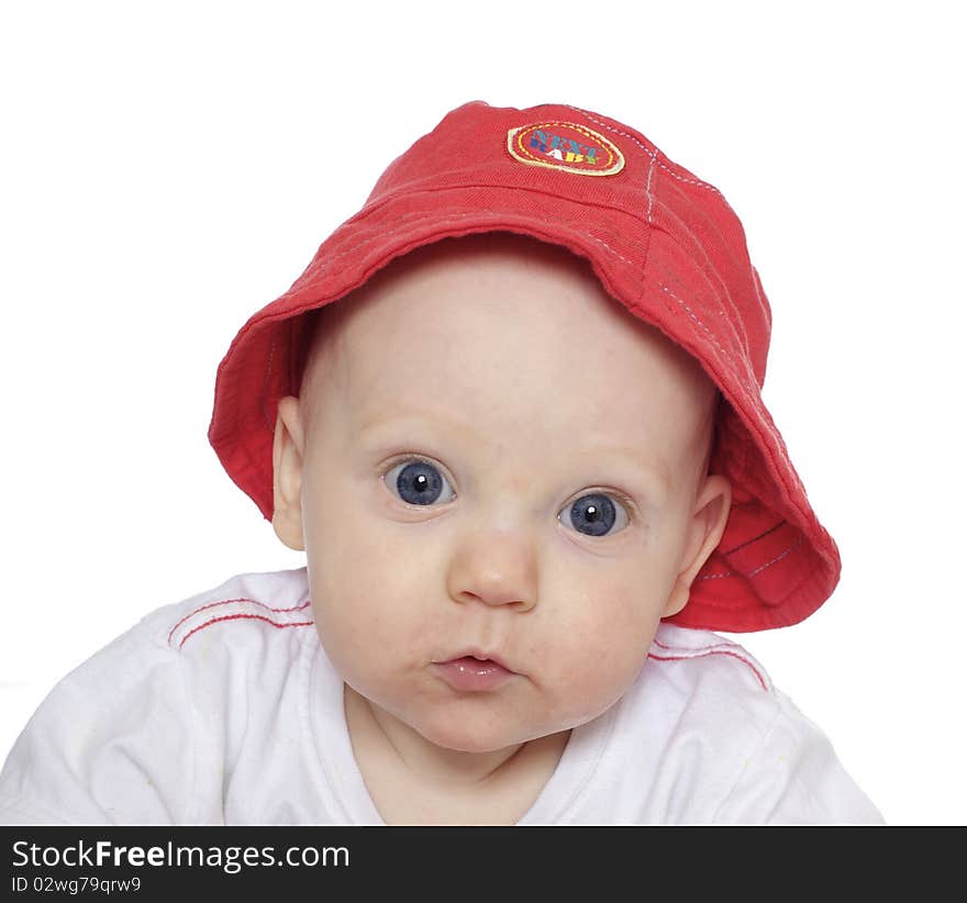 Cute baby boy in red hat