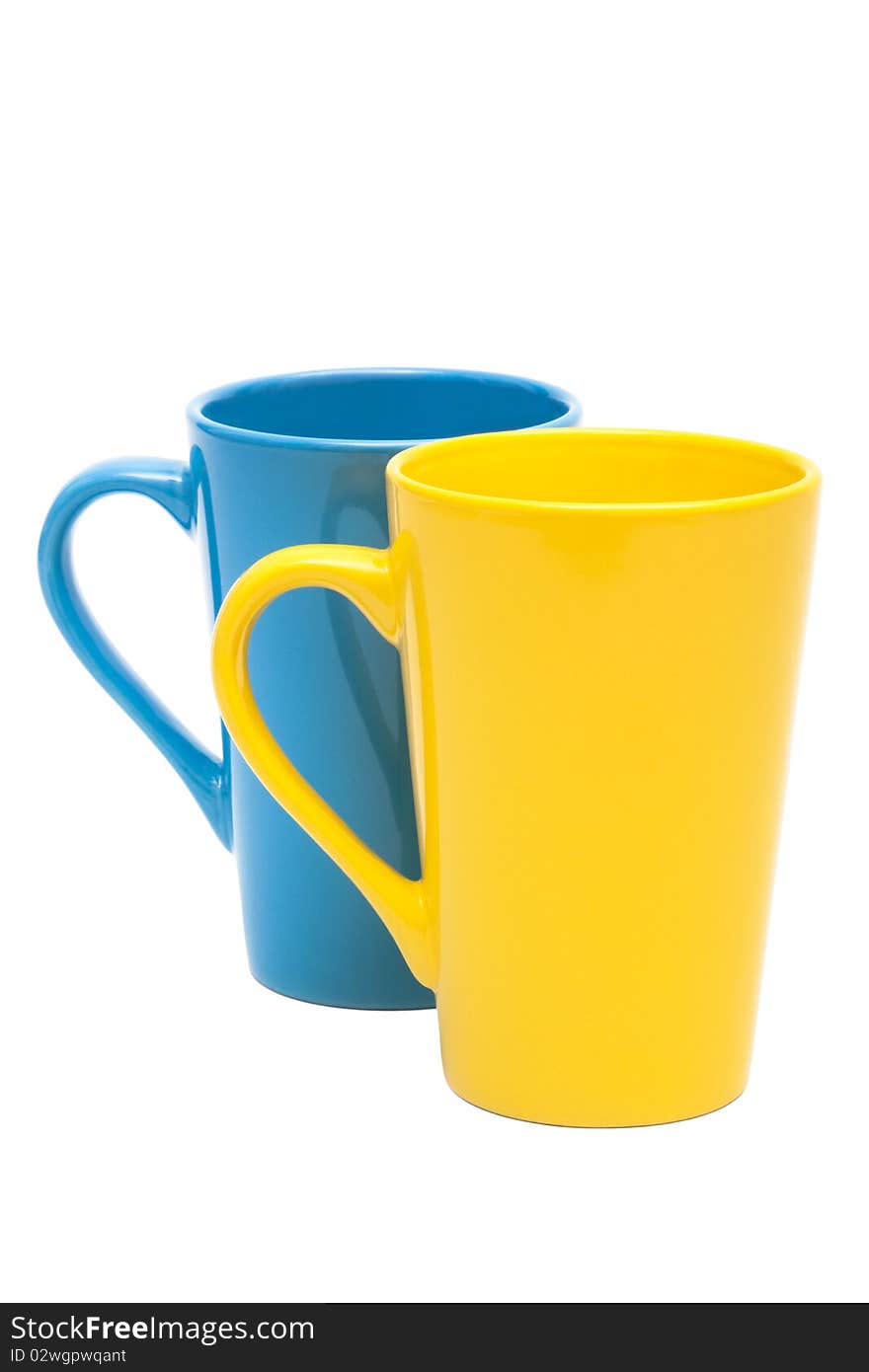 Yellow and blue mug on a white background