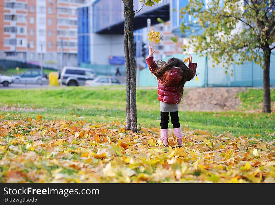 Adorable small girl with long dark hair