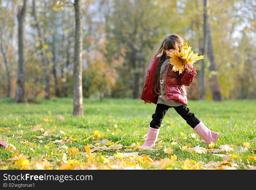 Adorable small girl with long dark hair