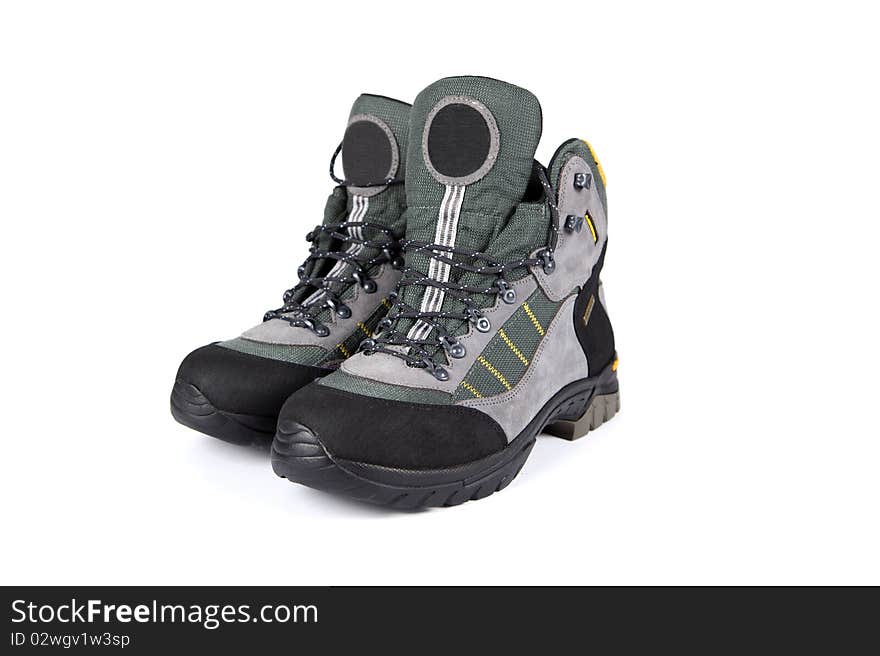 Brand new hiking boots isolated on white background. Brand new hiking boots isolated on white background