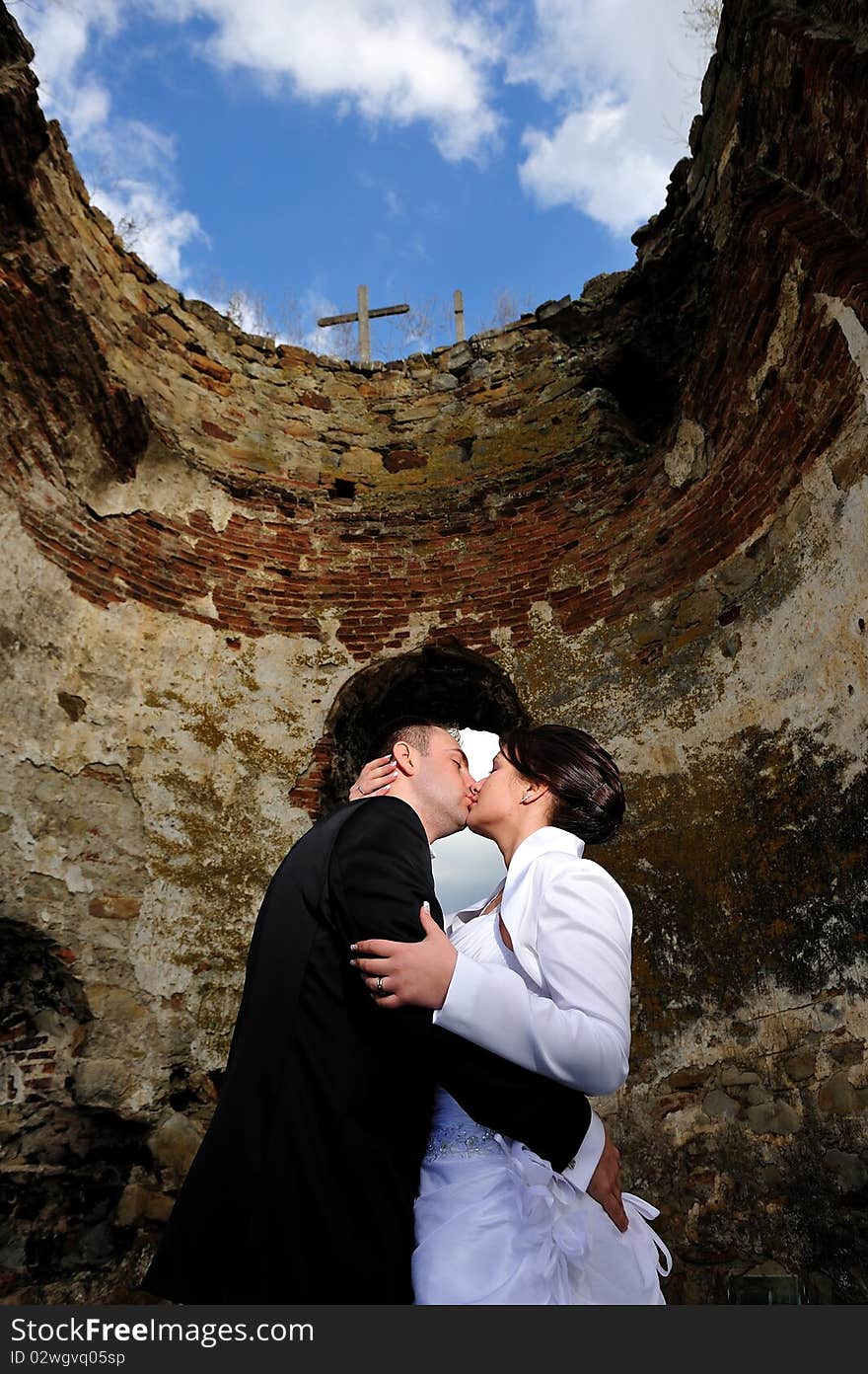 Bride and groom kissing