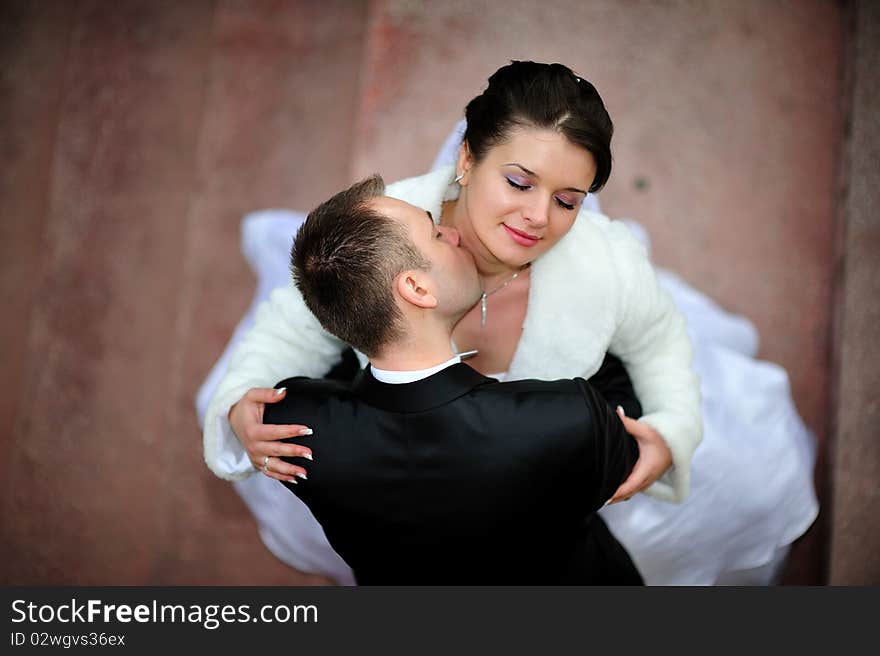 Bride and groom kissing