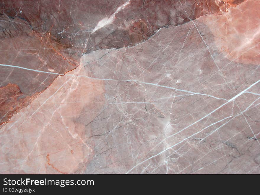 Red and brown marble with thiny white line