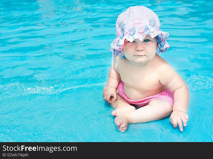 Cute little girl in waterpool