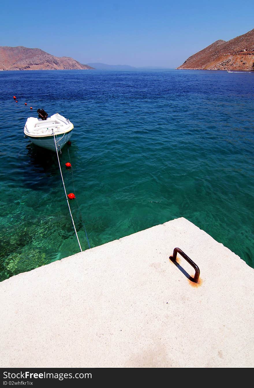 Boat In Bay Of Symi Island