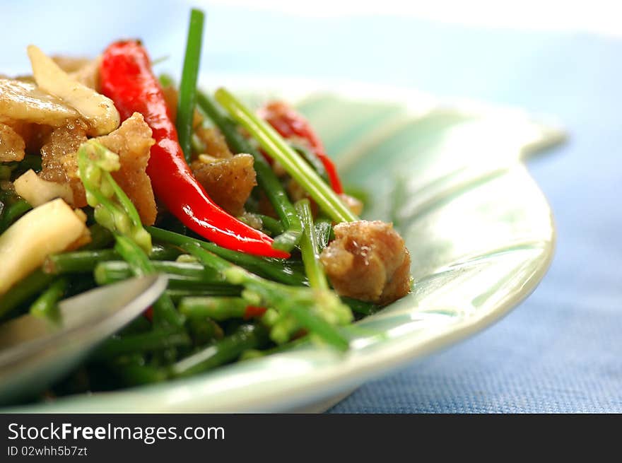 Chive Flowers (Dok Gui Chai) are the flowering tips of chives and are used in stir-fries.