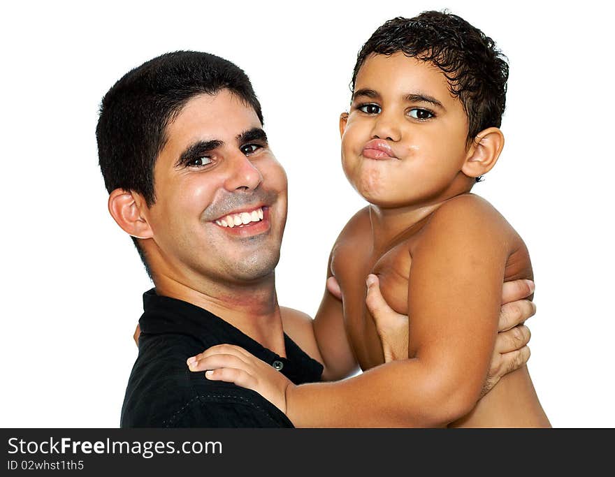 A happy young father carrying his son making a funny face on a white background. A happy young father carrying his son making a funny face on a white background