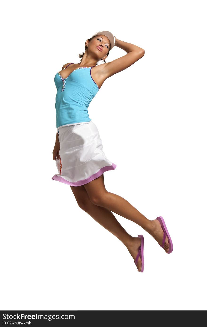 Caucasian female jumping into the air