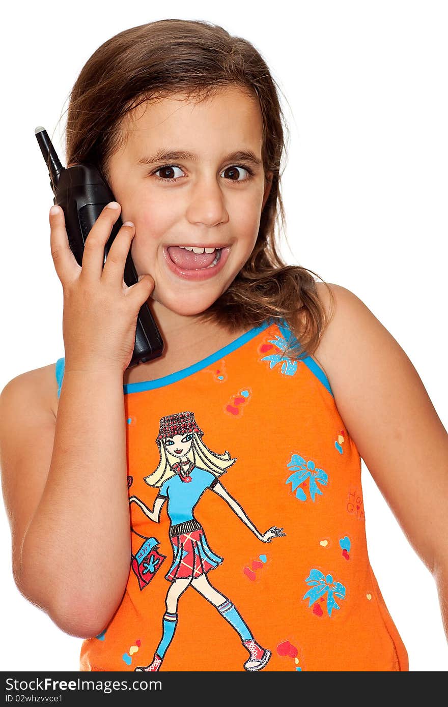 Beautiful girl with a happy expression talking on the phone on a white background. Beautiful girl with a happy expression talking on the phone on a white background