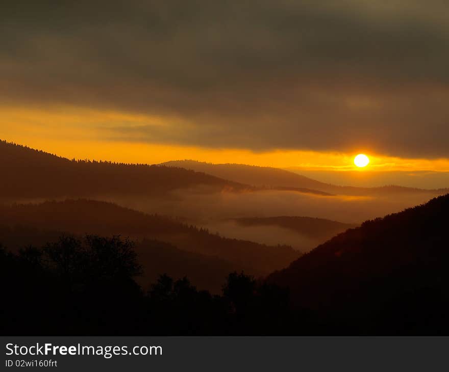 Early morning among hills in autumn. Early morning among hills in autumn