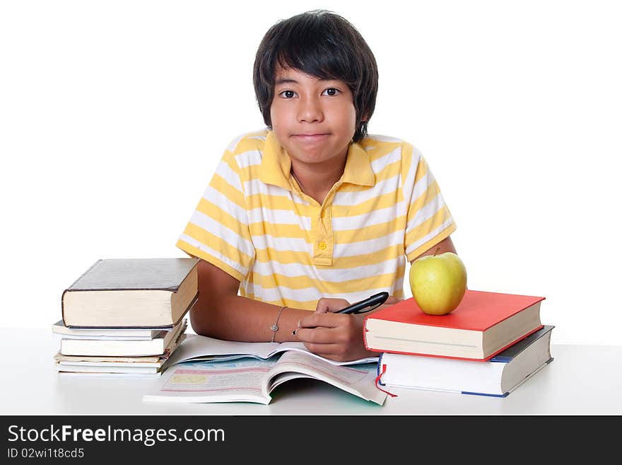 Learn for school, young student make his homework against white background