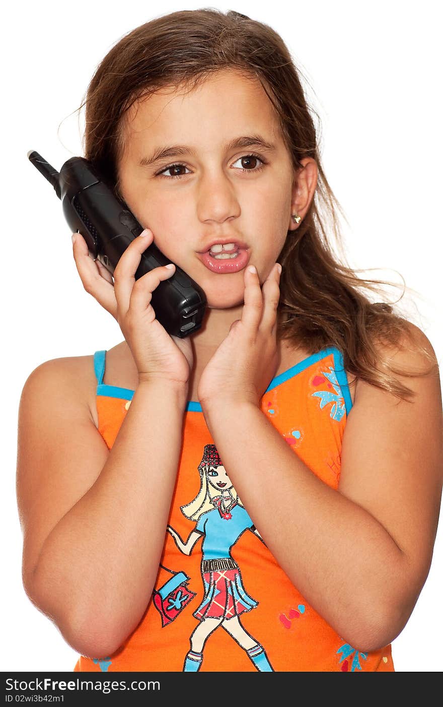 Beautiful girl with a happy expression talking on the phone on a white background. Beautiful girl with a happy expression talking on the phone on a white background