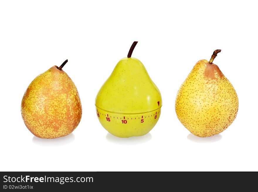 Two Ripe Fresh Pears And Green Plastic Pear Timer