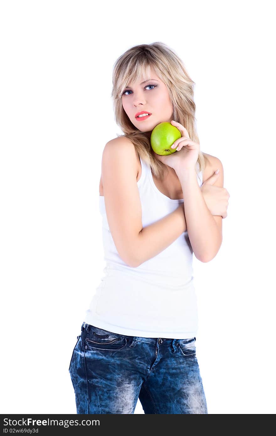 Young girl over white background with apple. Young girl over white background with apple