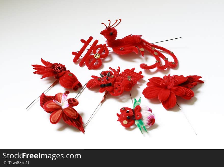 Traditional Chinese hair ornaments in shape of phoenix, golden fish, flowers, etc.