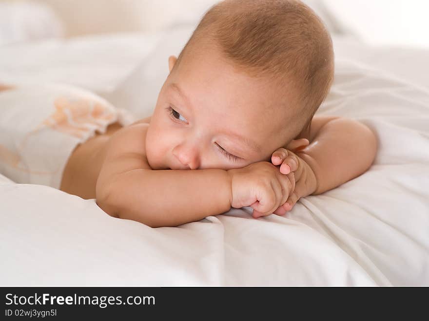 Portrait of a beautiful newborn on a white