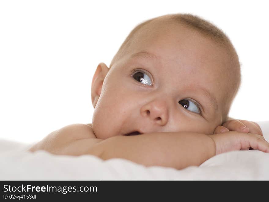 Portrait of a beautiful newborn on a white