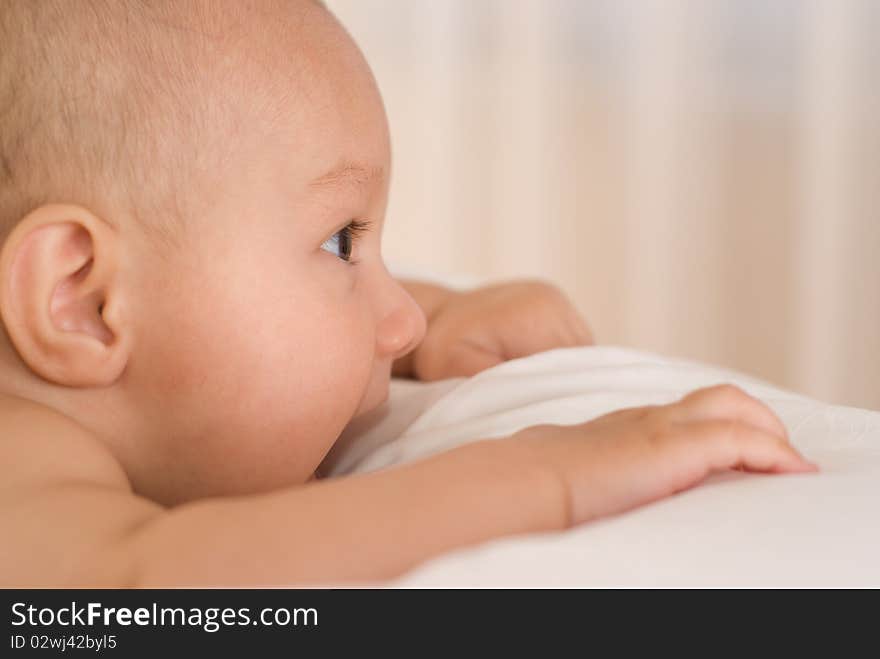 Portrait of a beautiful newborn on a white