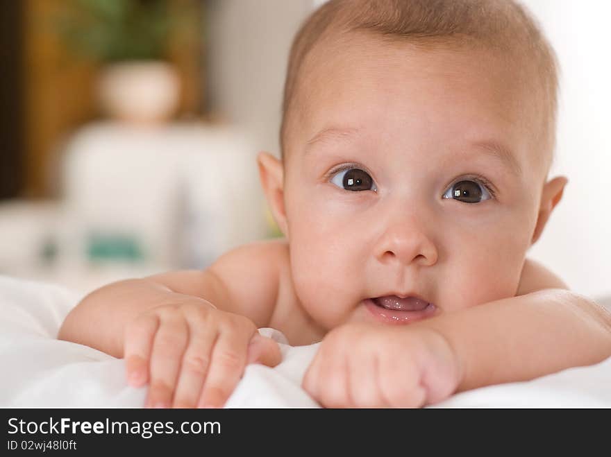 Portrait of a beautiful baby on a white