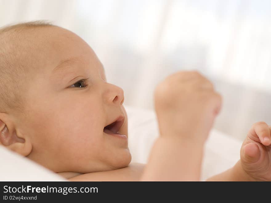 Portrait of a beautiful newborn on a white