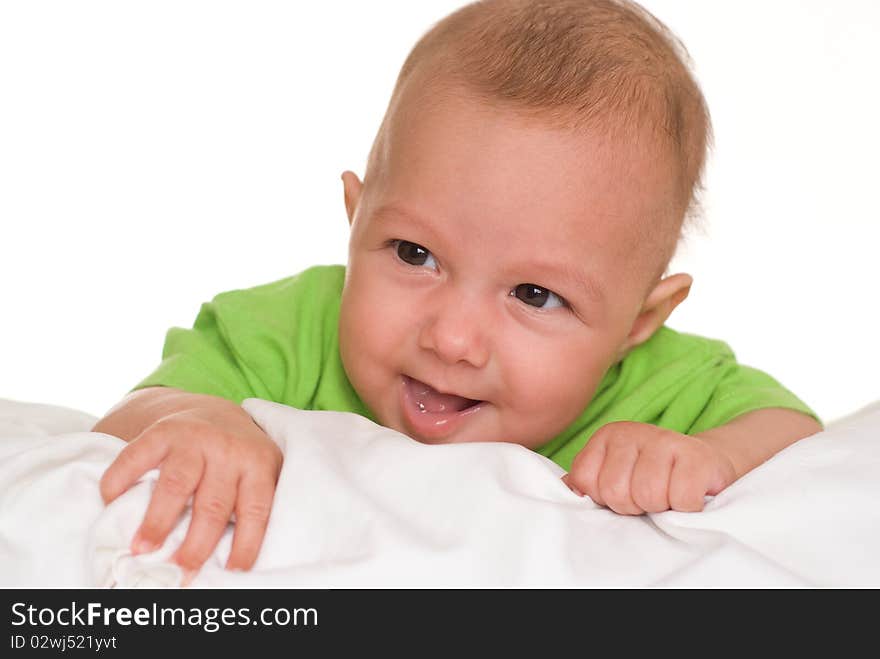 Portrait of a beautiful baby in green