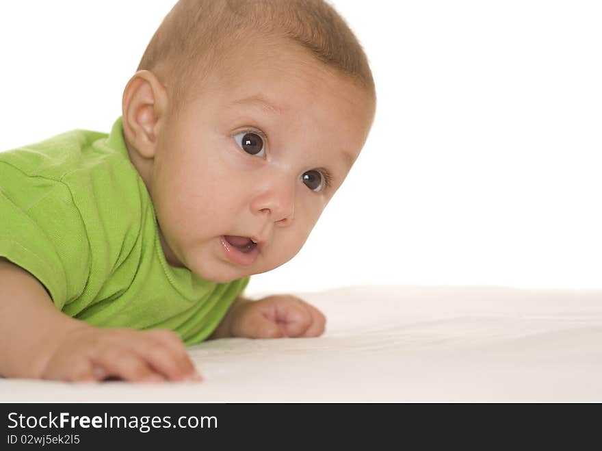 Portrait of a beautiful newborn in green