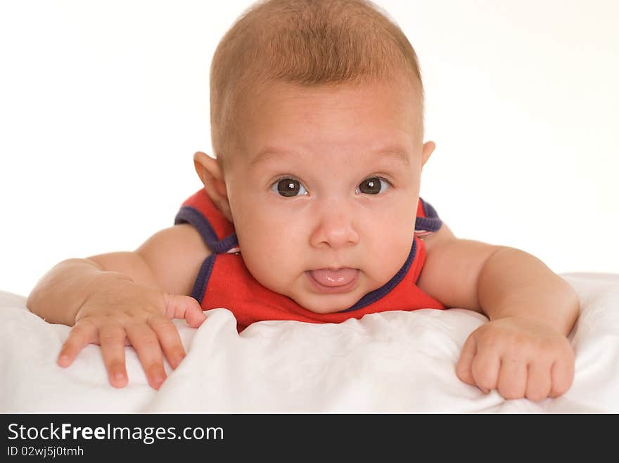 Portrait of a beautiful newborn in red