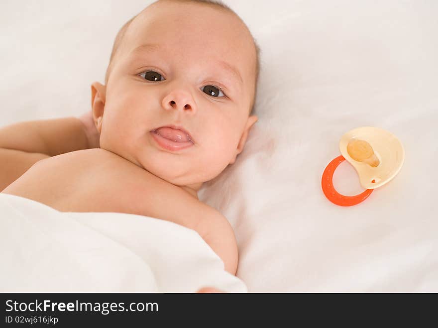 Portrait of a happy baby  on a white