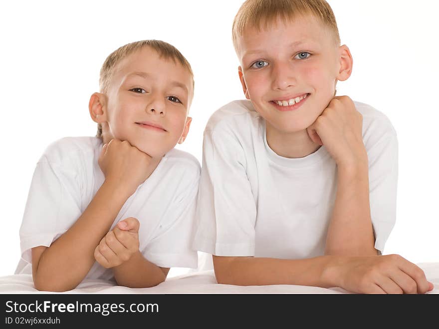 Two brothers on a white