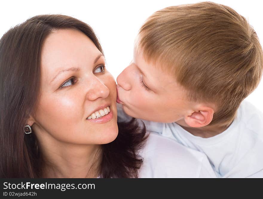 Happy mother with her child on a white