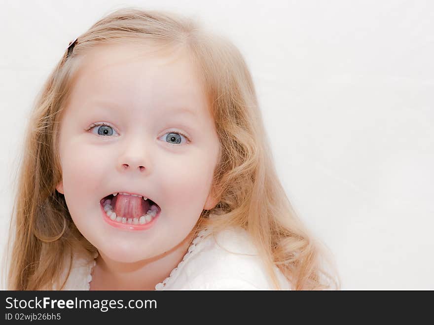 A Little girl pulling faces. A Little girl pulling faces