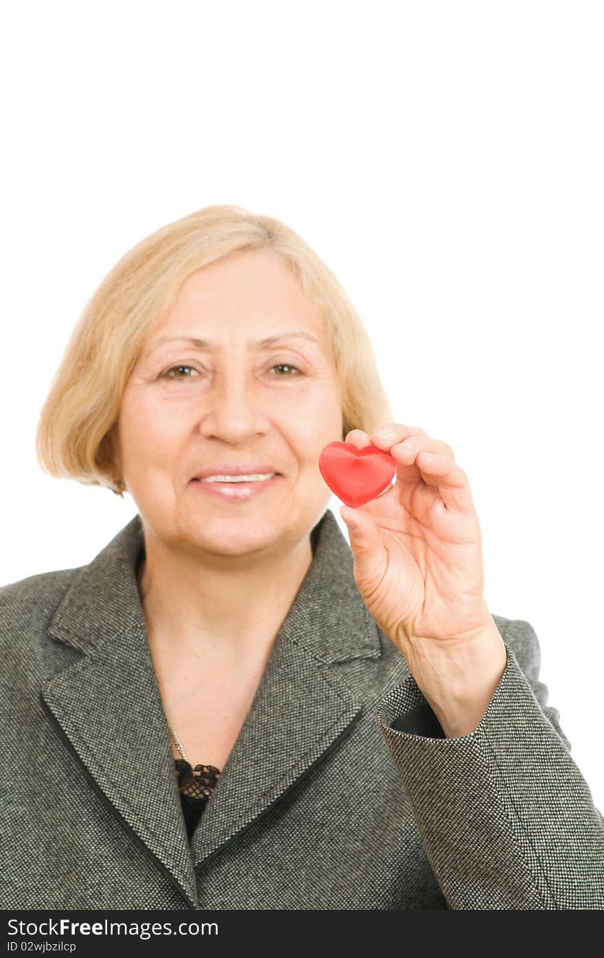 Senior woman holding red Heart isolated on white background. Senior woman holding red Heart isolated on white background