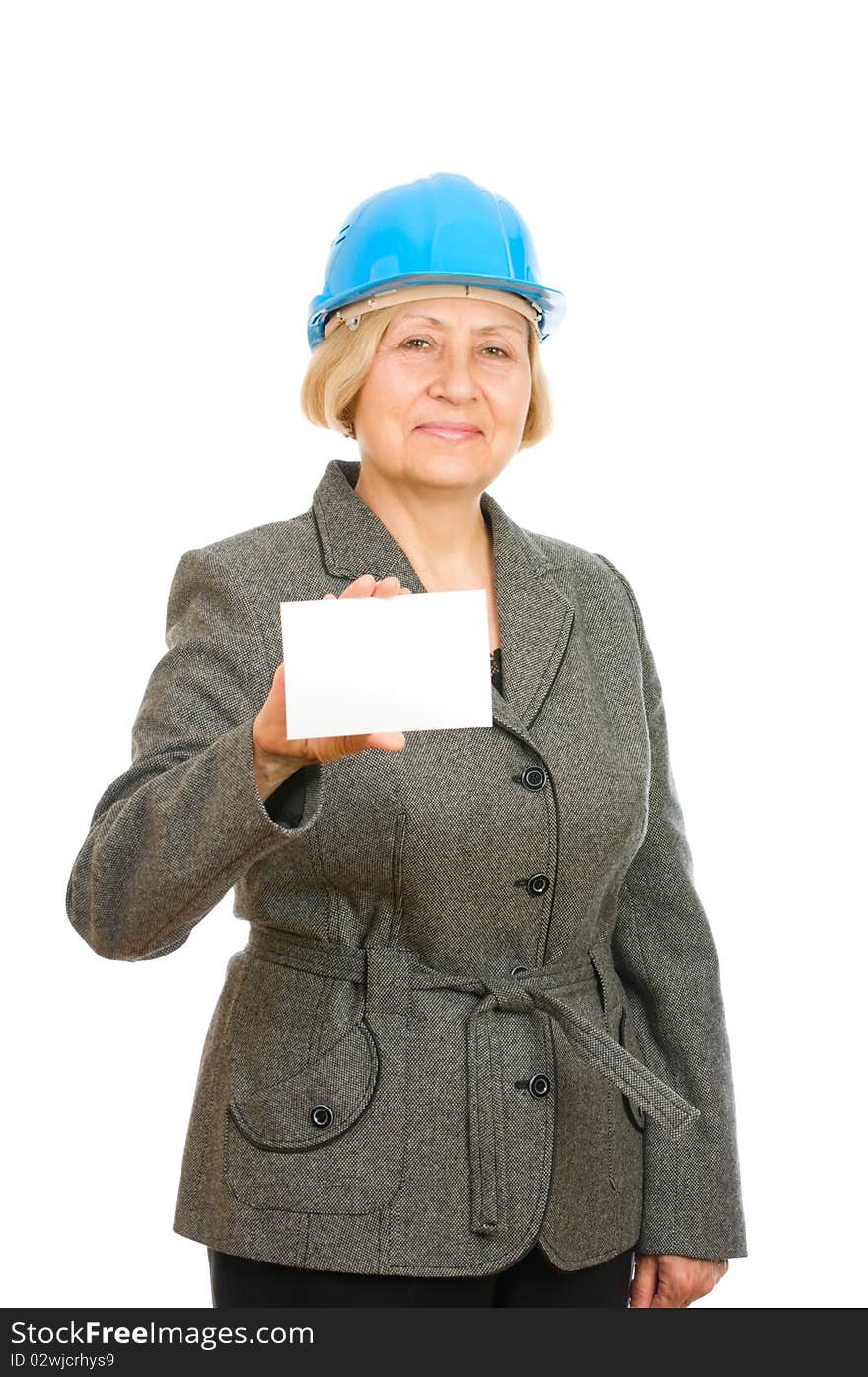 Senior woman with blue hard hat holding a blank card isolated on white background