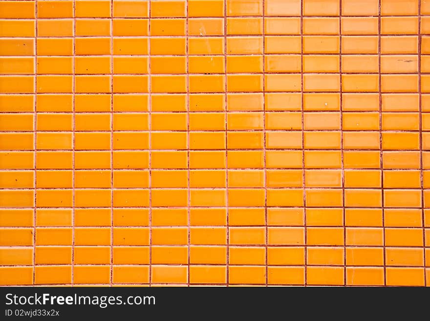 Ceramic orange on wall texture. Ceramic orange on wall texture