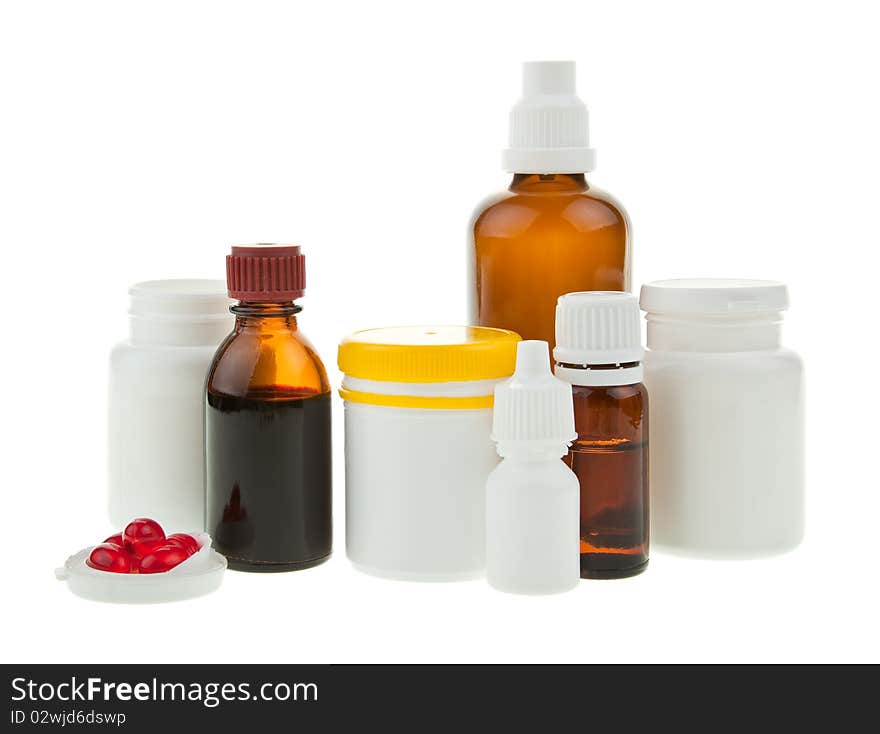 Medical supplies - vial bottles and pills on white background. Medical supplies - vial bottles and pills on white background