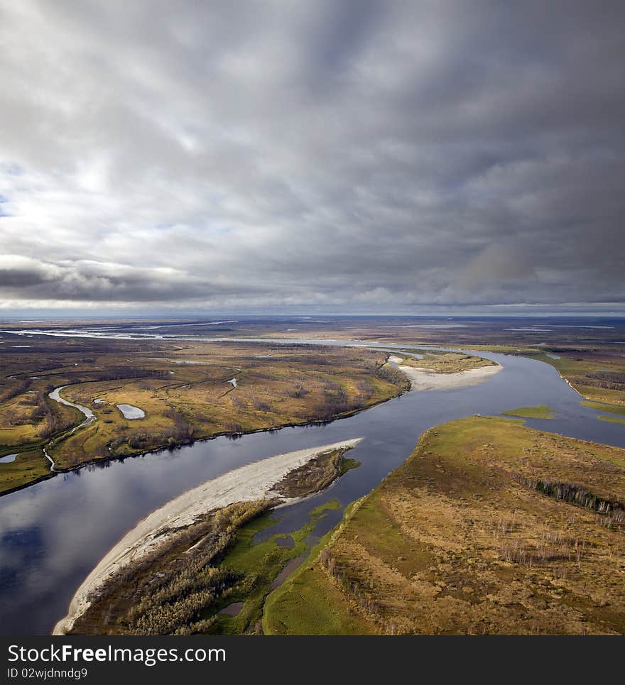 The Aerial view overhand of great river by autumn.