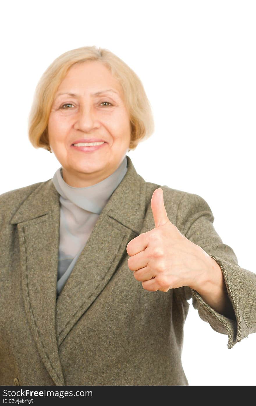 Portrait of a senior woman showing thumb up isolated on white background