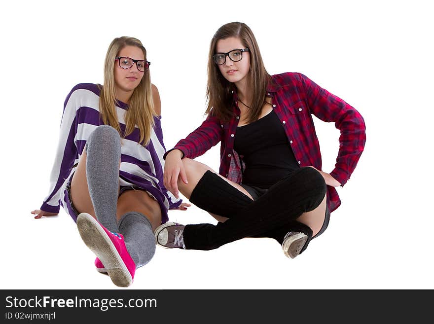 Young trendy teenagers in a nerd / geek style. Isolated over white background. Young trendy teenagers in a nerd / geek style. Isolated over white background.