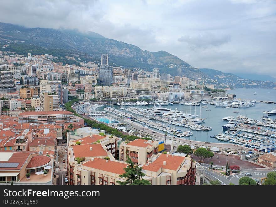 Monaco, view of Port Hercule and Monte-Carlo. Monaco, view of Port Hercule and Monte-Carlo.